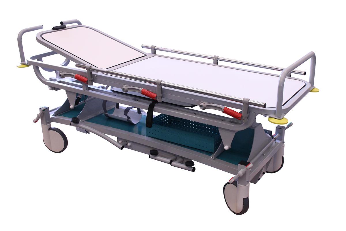 BRANCARD À HAUTEUR VARIABLE AVEC DESSUS RADIOTRANSPARENT ET TIROIR POUR PLAQUES RADIOLOGIQUES